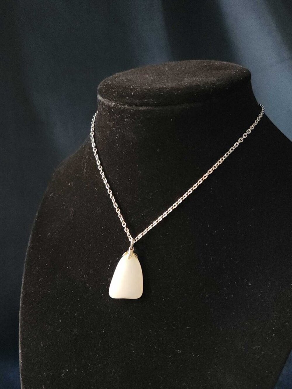 White natural stone necklace with a small silver chain